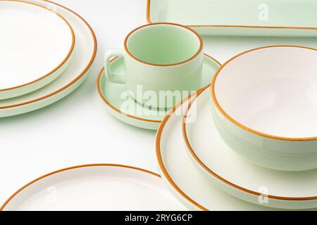A set of ceramic tableware isolated on white background Stock Photo