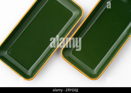 A set of green ceramic plates on a white background Stock Photo
