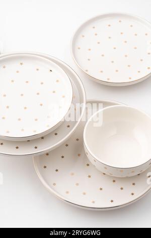 A set of ceramic tableware isolated on white background Stock Photo