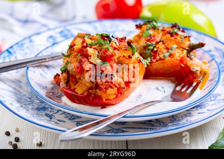 Stuffed red peppers with herbs. Stock Photo