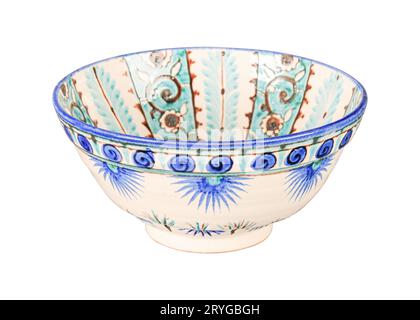 A vintage oriental ceramic bowl isolated on a white background Stock Photo