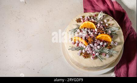 Cristmas cake decorated rosemary cranberries Stock Photo