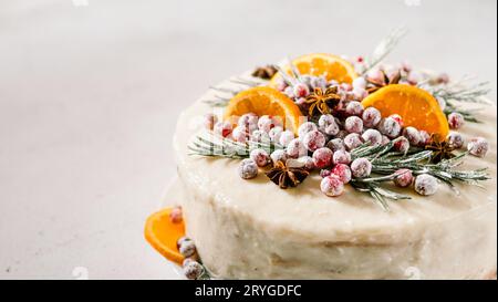 Cristmas cake decorated rosemary cranberries Stock Photo