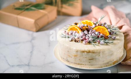 Cristmas cake decorated rosemary cranberries Stock Photo