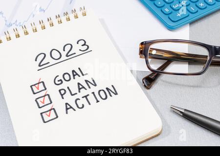 New year 2023 goal, plan, action checklist on notepad. Business financial plan concept Stock Photo