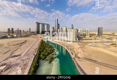 Aerial view from the drone on developing part of Al Reem island in Abu Dhabi on a cloudy day Stock Photo