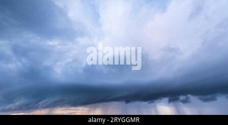 Cloudy sky with gloomy rain clouds Stock Photo