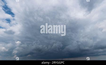 Cloudy sky with gloomy rain clouds Stock Photo
