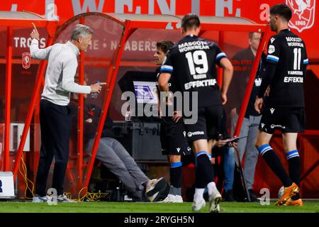 ENSCHEDE, NETHERLANDS - SEPTEMBER 30: head coach Kees van Wonderen (SC Heerenveen) and Mats Kohlert (SC Heerenveen) speaks with during the Eredivisie Stock Photo