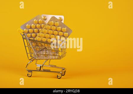 Several blister packs of pills in shopping cart Stock Photo