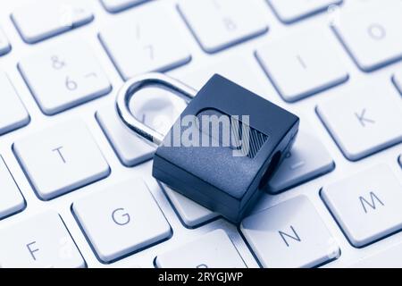 Computer Security and data privacy concept. Closed padlock on computer keyboard Stock Photo