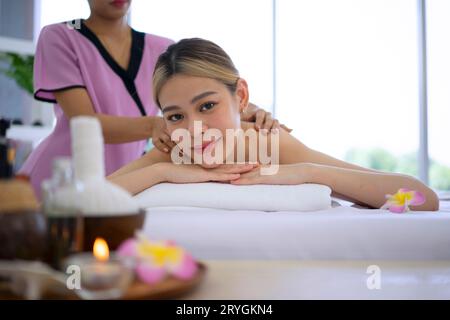 Pretty women spend time at resort and spa hotel. Travel and leisure activity concept. Stock Photo