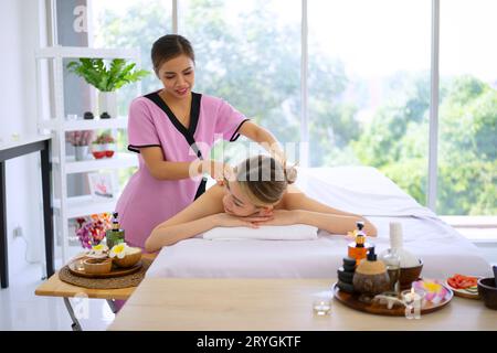 Pretty women spend time at resort and spa hotel. Travel and leisure activity concept. Stock Photo