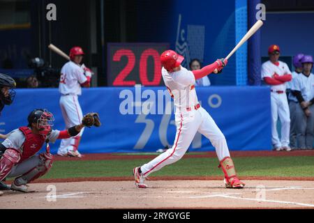 Shaoxing, China's Zhejiang Province. 1st Oct, 2023. Luo Jinjun (R) of China competes during the Men's Second Group Round A of Baseball at the 19th Asian Games in Shaoxing, east China's Zhejiang Province, Oct. 1, 2023. Credit: Weng Xinyang/Xinhua/Alamy Live News Stock Photo