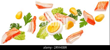Falling crab sticks salad ingredients isolated on white background Stock Photo