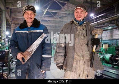 Two bad unskilled workers Stock Photo