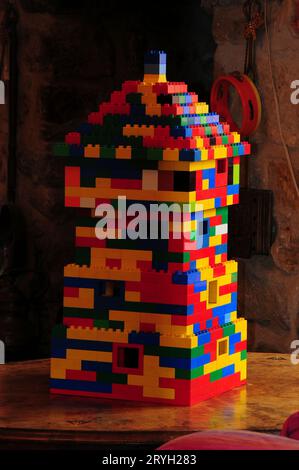 Four-storey house built with Duplo construction bricks for toddlers Stock Photo