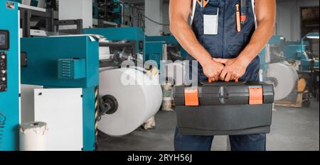 Man working in printing house Stock Photo