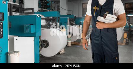Man working in printing house Stock Photo