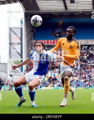 Blackburn Rovers' Callum Brittain (right) is tackled by Sheffield ...