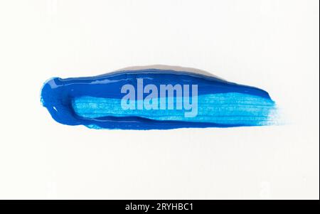 Blue paint Brush Stroke isolated on white paper canvas Stock Photo