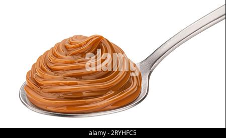 Melted caramel cream in spoon isolated on white background Stock Photo
