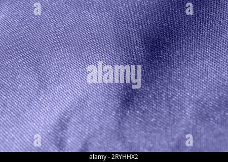 Very Peri. Color of the year 2022. Fabric Texture. Macro. Abstract Pattern of Textile. Close Up. Denim. Background with Textured Material and Polyeste Stock Photo