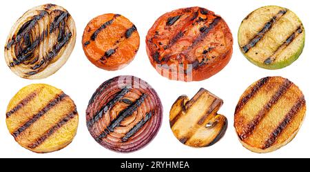 Falling grilled vegetable slices isolated on white background Stock Photo