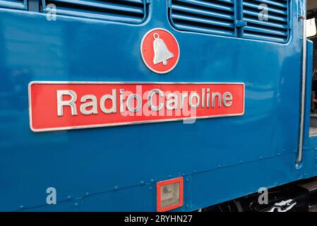 Mangapps Railway Museum, Burnham on Crouch, Essex, UK. 1st Oct, 2023. Rock musician and railway enthusiast Rick Wakeman has unveiled a nameplate on a restored vintage Class 31 diesel – ‘Radio Caroline’. The diesel locomotive numbered 31105 was built in 1959 and was used by British Rail on its mainlines and other uses before retirement in 2014.  Arriving at Mangapps in 2019 the loco has recently been restored into pristine BR blue livery. A new Radio Caroline radio station broadcasts locally and was involved with the naming. Wakeman took to the cab for a drive Stock Photo