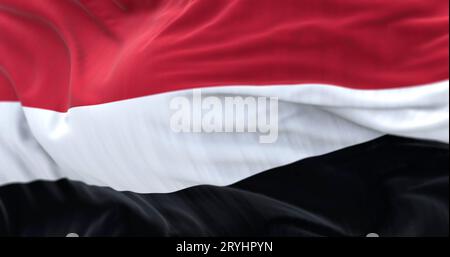 Close-up view of the Yemen national flag waving Stock Photo - Alamy