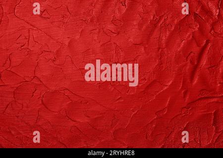 Red uneven grunge surface abstract background Stock Photo