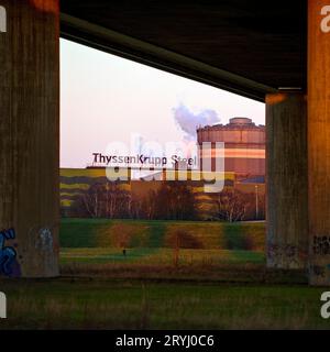 A42 motorway bridge and ThyssenKrupp Steel hot strip slitting plant, Duisburg, Germany, Europe Stock Photo