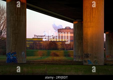 A42 motorway bridge and ThyssenKrupp Steel hot strip slitting plant, Duisburg, Germany, Europe Stock Photo