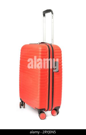 Travel red suitcase isolated on white background. Stock Photo