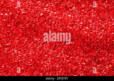 Red Shiny Fabric Glitter Texture Background Close Up. Stock Photo