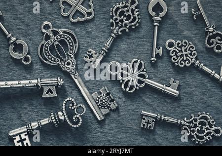 Vintage keys on gray wooden background Stock Photo