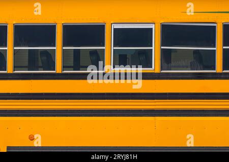 A close up to a yellow SCHOOL BUS sign. Concept: Students ...