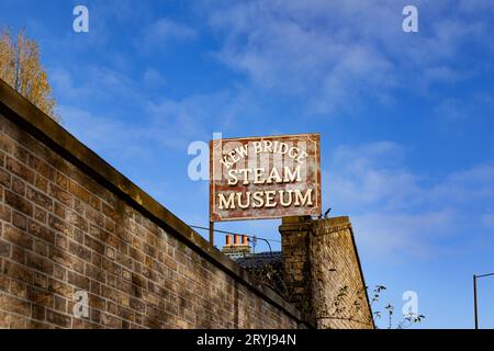 Kew Bridge Steam museum sign against bright blue sky Stock Photo