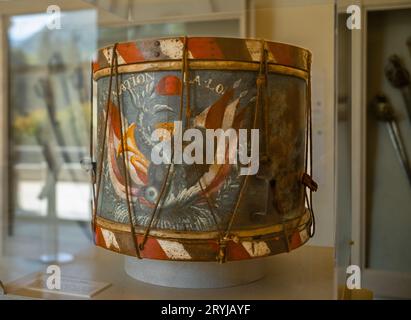 A military drum adorned with patriotic paintings and rope that dates to the French Revolution in 1789 on display at The Museum of the French Revolutio Stock Photo