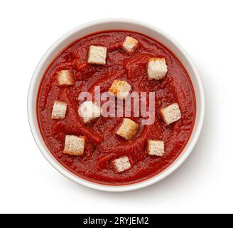 Tomato soup with croutons isolated on white background, top view Stock Photo