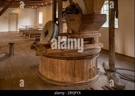 millstone for grinding inside an old watermill at Esrum Abbey Denmark, September 30, 2023 Stock Photo