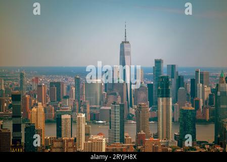 Aerial cityscape about The New york city's skyscrapers. Lower Manhattan business distict with One world trade center. Brooklyn is on the background wi Stock Photo