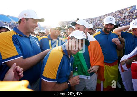 Team Europe's Rory McIlroy celebrates after Europe regained the Ryder Cup following victory over the USA on day three of the 44th Ryder Cup at the Marco Simone Golf and Country Club, Rome, Italy. Picture date: Sunday October 1, 2023. Stock Photo