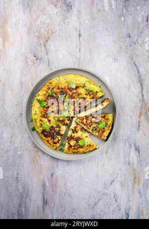 Traditional Italian vegetable frittata with zucchini Stock Photo