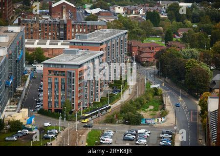 Rooftop view, looking down on Manchester City New islington area and Metrolink tram stop Stock Photo
