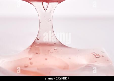 The texture of a pink cosmetic product. Stock Photo