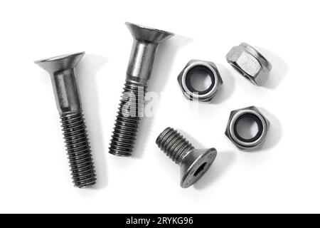 Flat head metric allen bolts and nuts isolated on white background Stock Photo