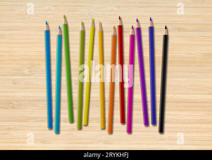Colored pencil group isolated on wooden background. Horizontal background Stock Photo