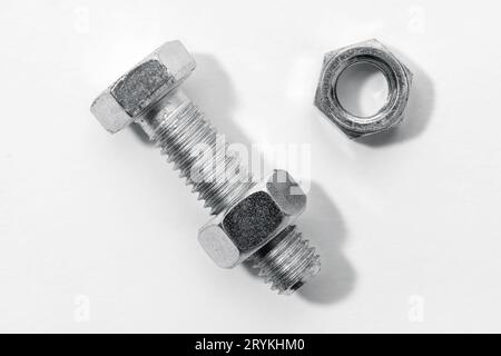Bolt and nut isolated on white background Stock Photo