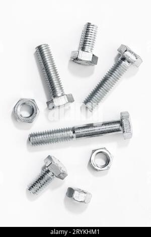 Bolts and nuts isolated on white background Stock Photo